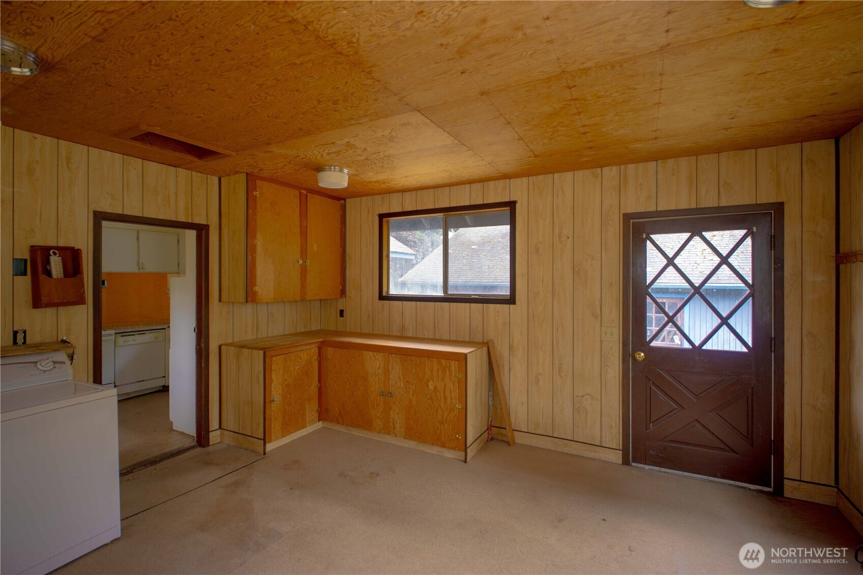 1122 West Spruce Street Port Angeles, WA 98363 - Photo 10 of 30 an empty room with windows