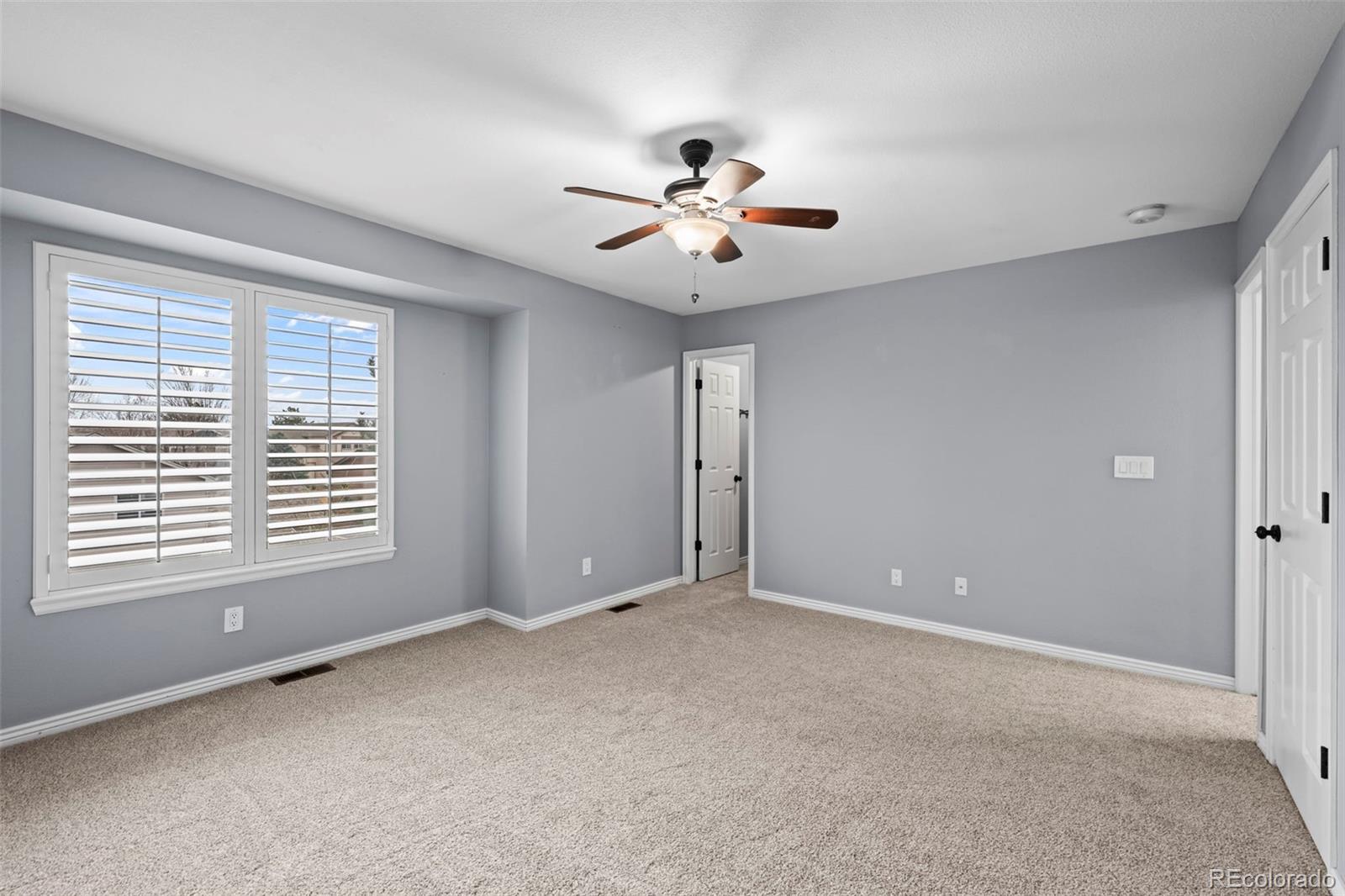 9664 Whitecliff Place Highlands Ranch, CO 80129 - Photo 15 of 46 a view of an empty room with a window