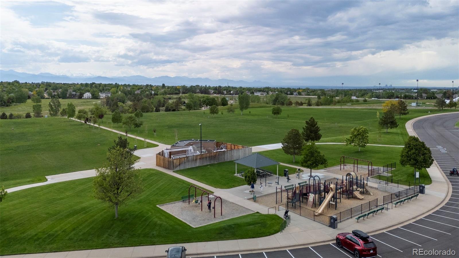 9664 Whitecliff Place Highlands Ranch, CO 80129 - Photo 22 of 38 an aerial view of a house having yard