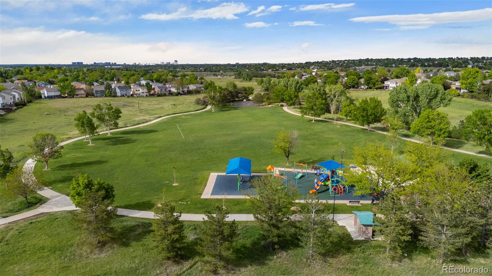 9664 Whitecliff Place Highlands Ranch, CO 80129 - Photo 29 of 38 an aerial view of a house with a garden