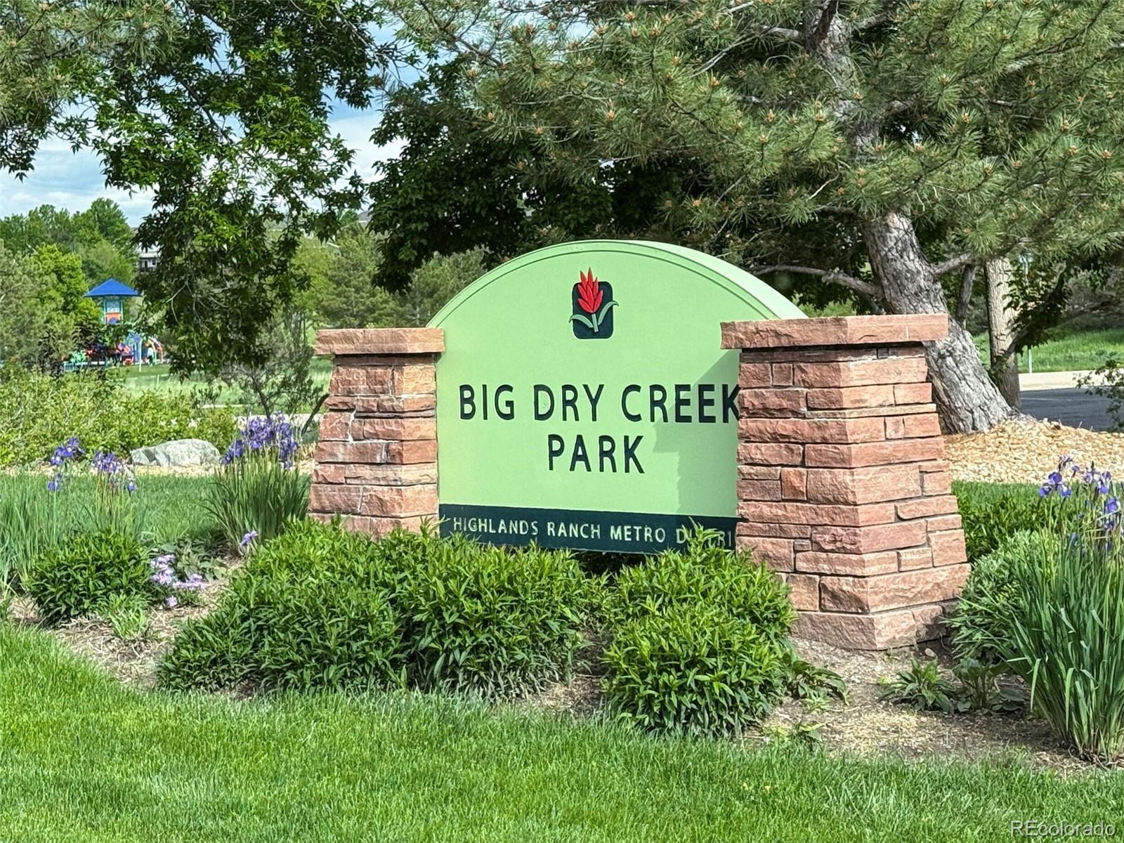 9664 Whitecliff Place Highlands Ranch, CO 80129 - Photo 36 of 46 a sign on the side of the road