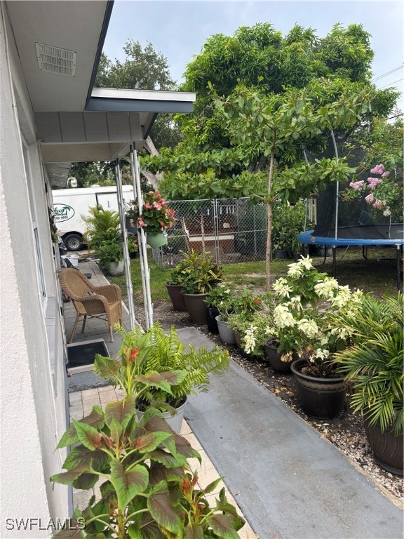 152 Prospect Avenue Fort Myers, FL 33905 - Photo 13 of 18 a view of a garden with a patio