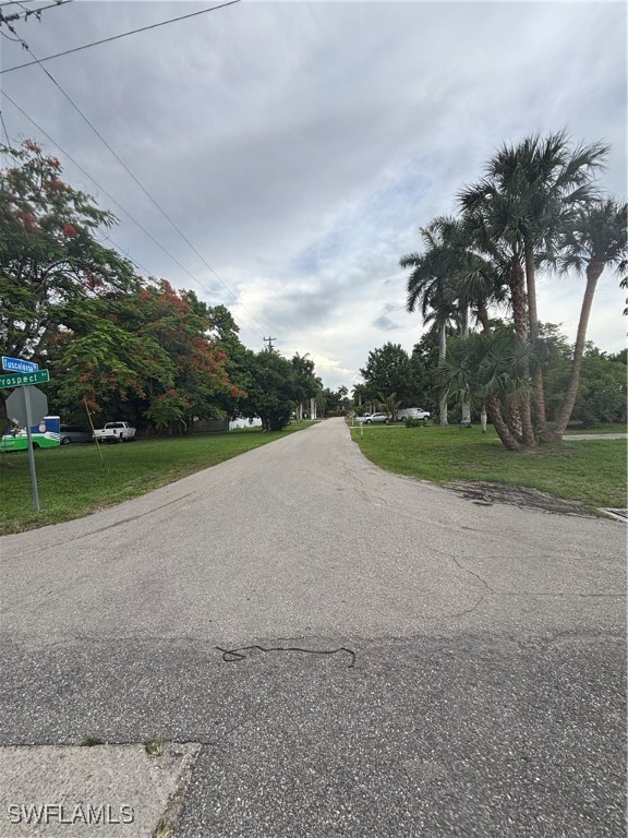 152 Prospect Avenue Fort Myers, FL 33905 - Photo 17 of 18 a view of a field with a trees in the background