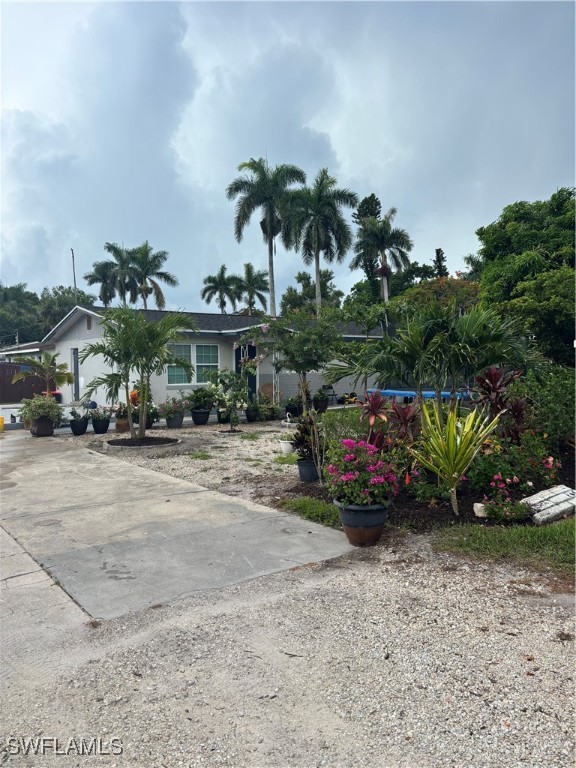 152 Prospect Avenue Fort Myers, FL 33905 - Photo 2 of 18 a view of a street with cars parked