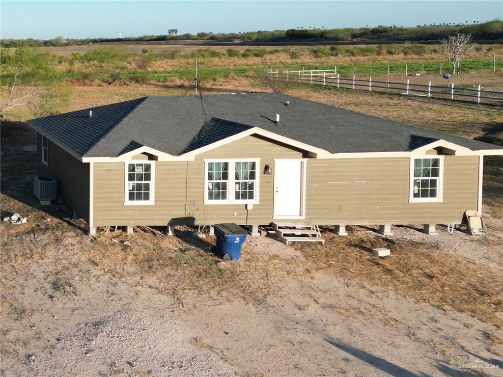20842 Bohemia Street Edcouch, TX 78538 - Photo 1 of 8 a front view of a house with lake view
