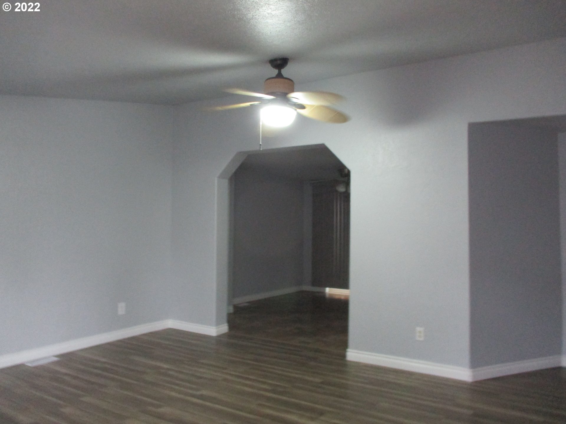 10038 South New Era Road, Unit 2 Canby, OR 97013 - Photo 14 of 20 a view of empty room with wooden floor