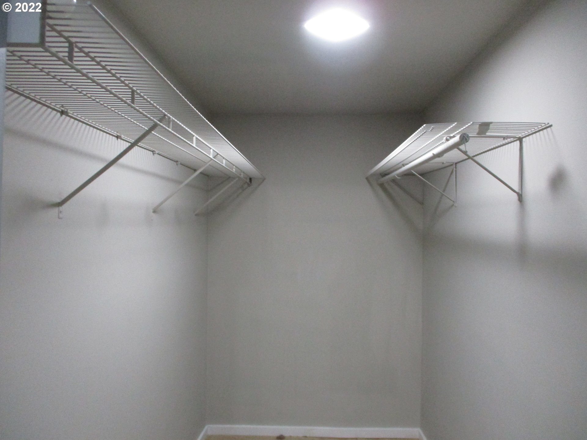 10038 South New Era Road, Unit 2 Canby, OR 97013 - Photo 7 of 20 a view of a room with racks on the wall
