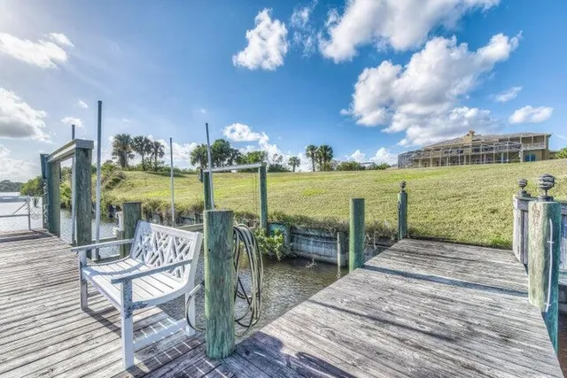 an outdoor space with patio swimming pool and outdoor seating