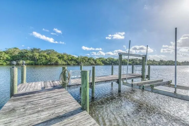 a view of a lake with sitting area
