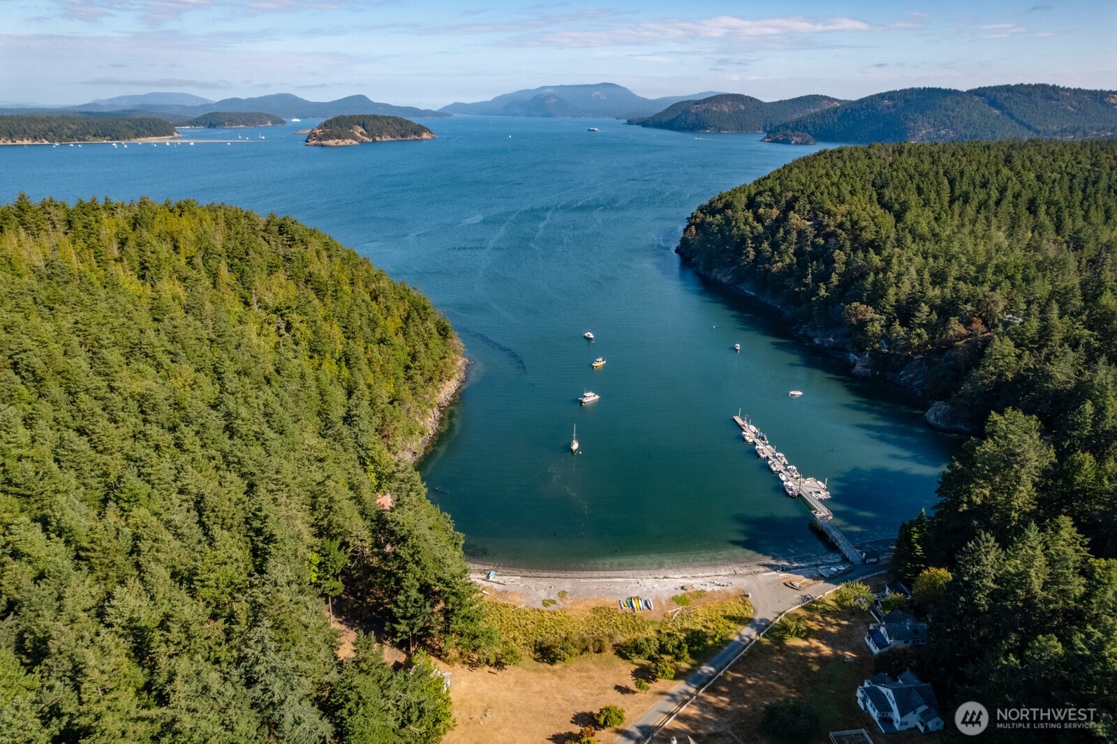 68 Sylvan Cove W Road Decatur Island, WA 98221 - Photo 29 of 35 a view of a wooden house with a yard