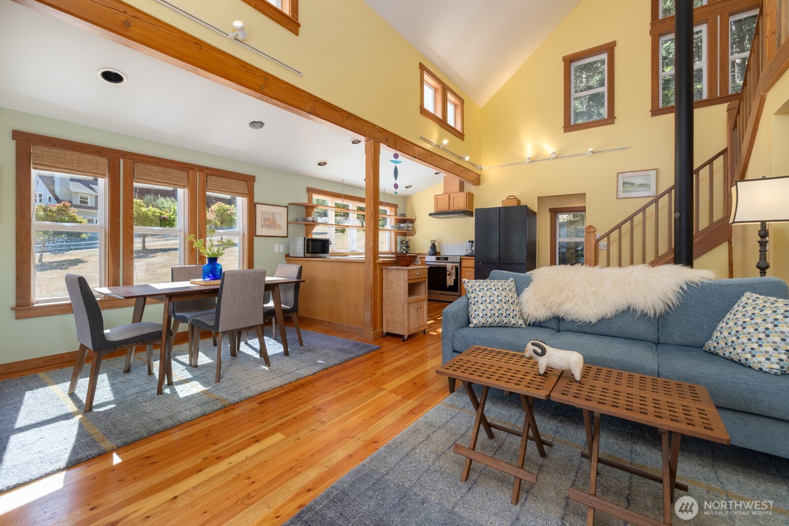 68 Sylvan Cove W Road Decatur Island, WA 98221 - Photo 9 of 35 a living room with furniture and a table