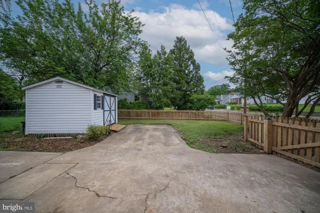 a view of backyard with green space