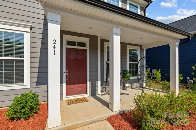 a workspace with furniture and a window