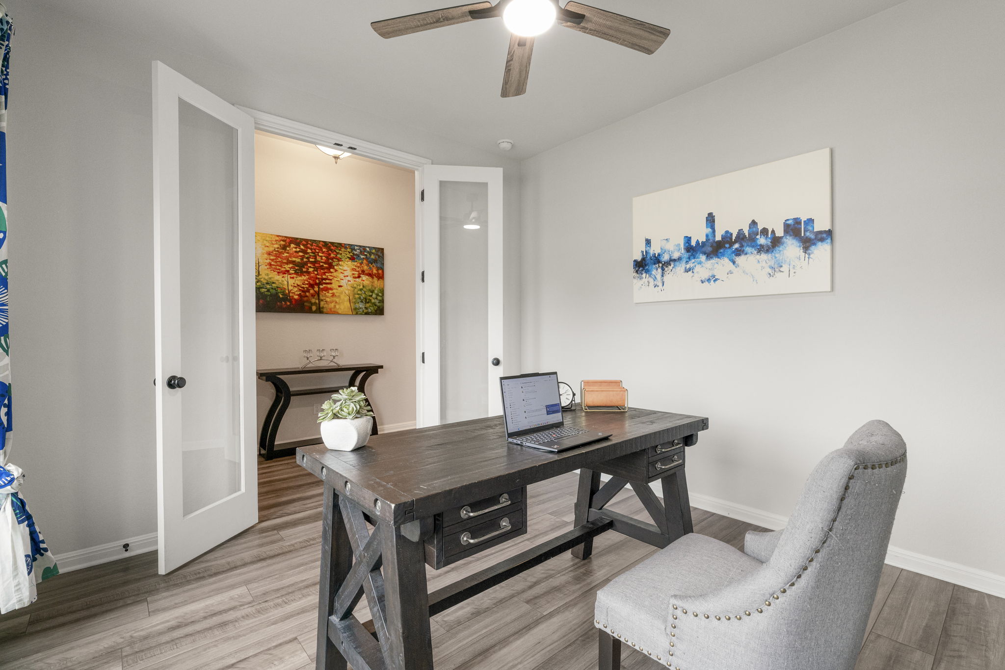 19412 Forman Drive Pflugerville, TX 78660 - Photo 17 of 34 Located just off the entry, the dedicated office provides a quiet and private workspace away from the main living areas.