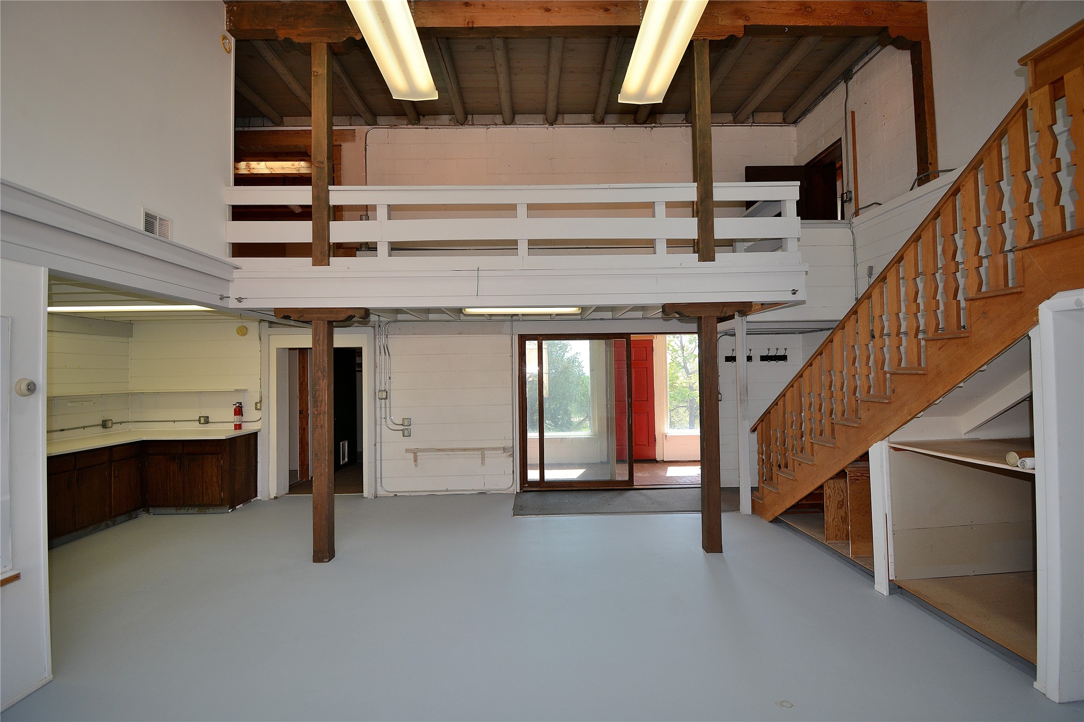 904 Bishops Lodge Road Santa Fe, NM 87501 - Photo 24 of 51 Downstairs studio with view to upstairs gallery