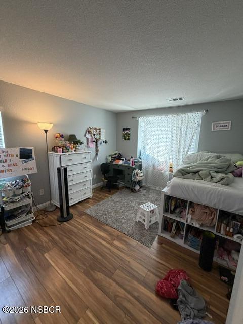 1114 Point Sal Loop Lompoc, CA 93436 - Photo 12 of 25 a bedroom with furniture and a dresser