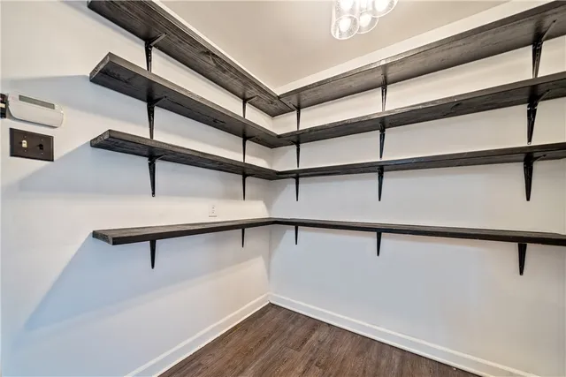 a view of a room with racks on the wall