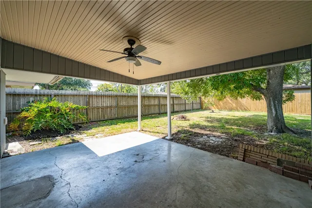 a view of an empty room with a balcony