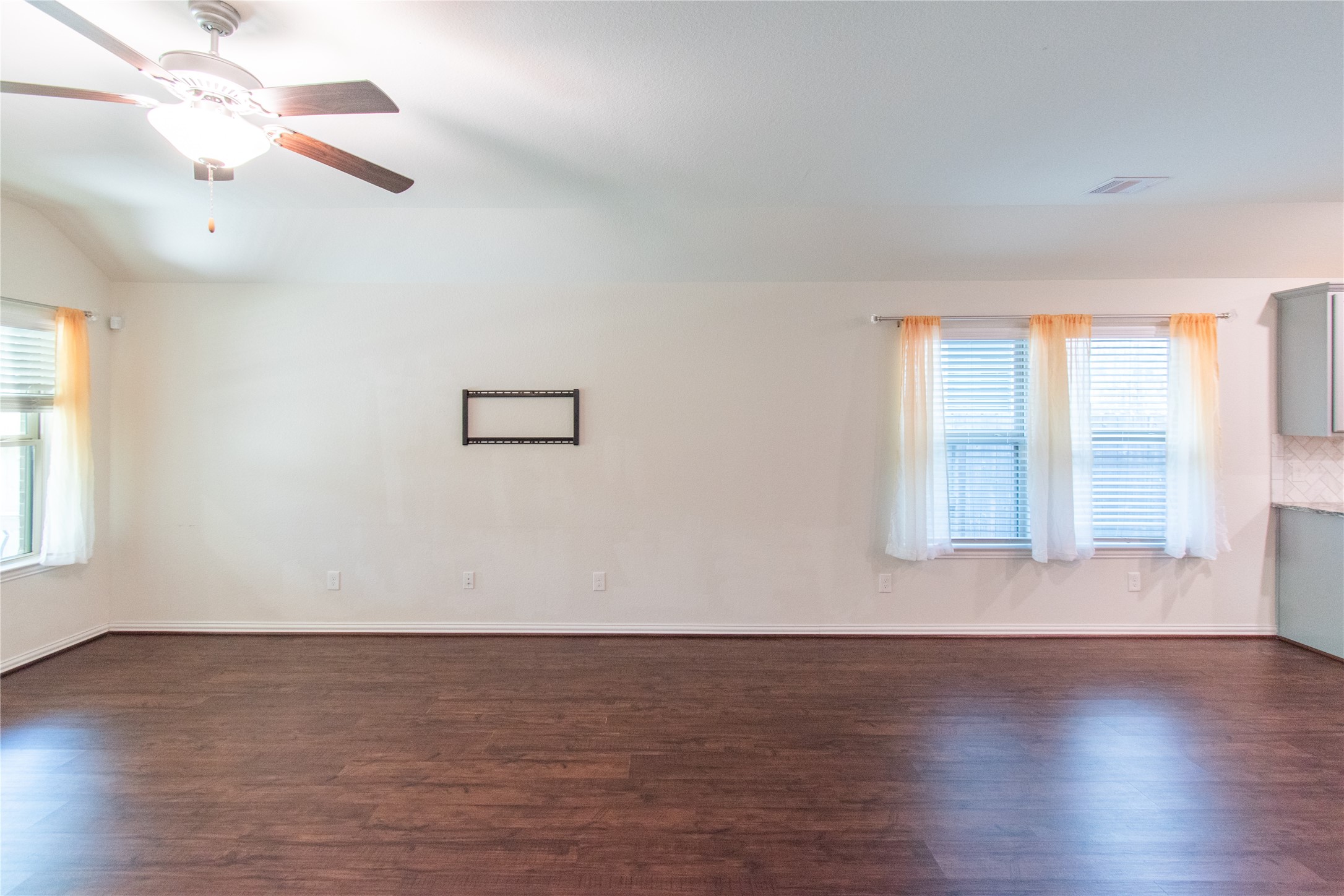 4639 Sequoia Echo Drive Spring, TX 77386 - Photo 13 of 30 an empty room with wooden floor and windows
