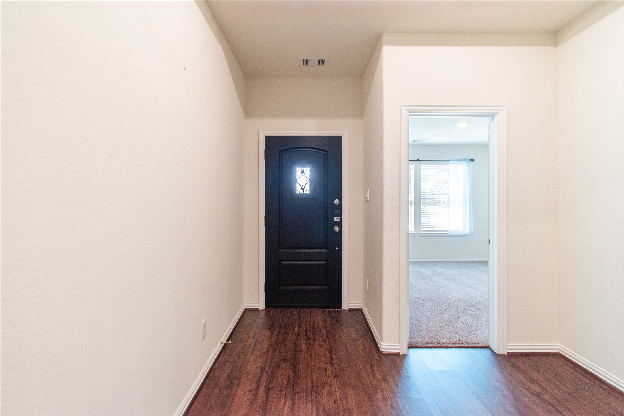 4639 Sequoia Echo Drive Spring, TX 77386 - Photo 19 of 30 wooden floor in a hall with an empty room