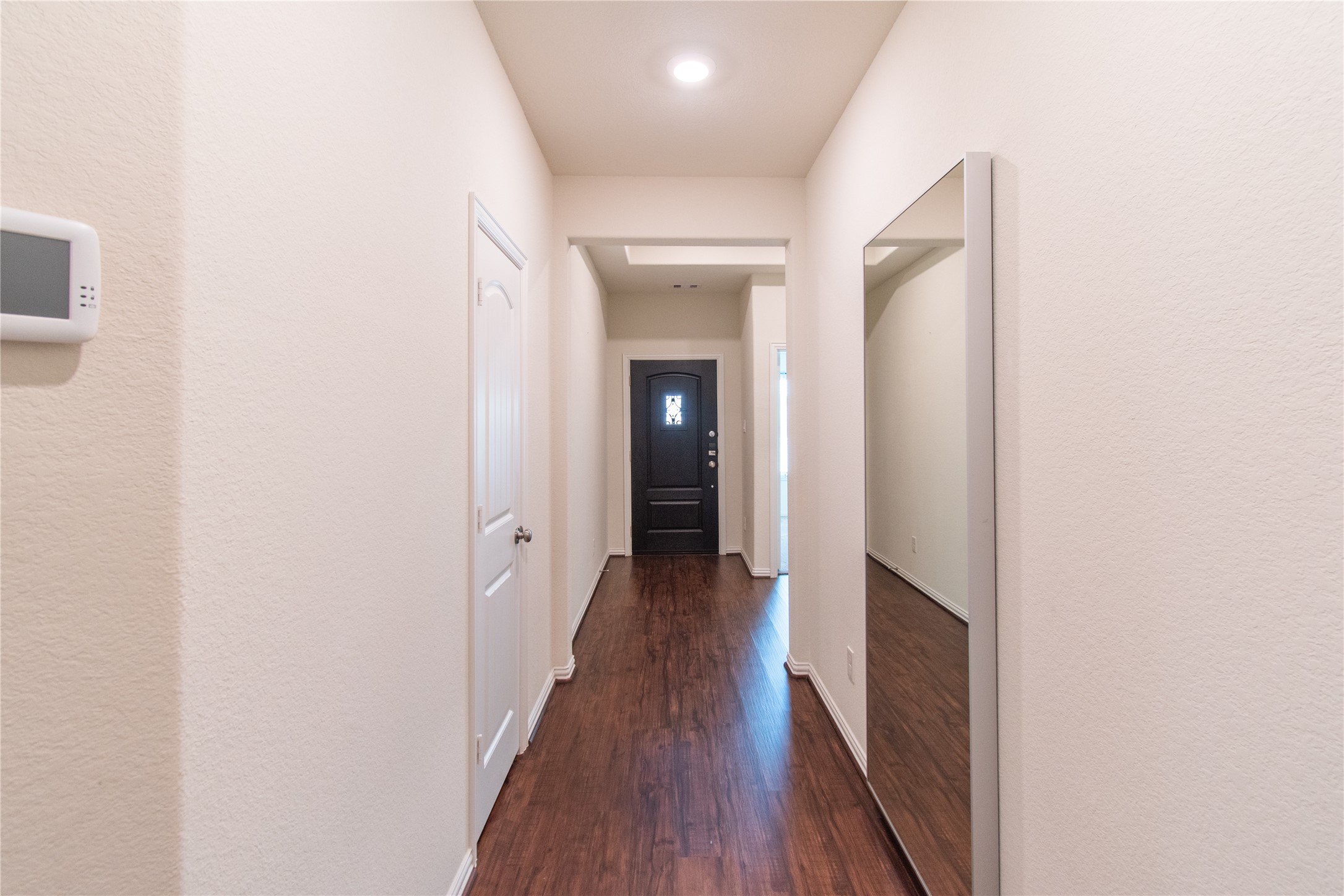 4639 Sequoia Echo Drive Spring, TX 77386 - Photo 21 of 30 a view of a hallway with wooden floor