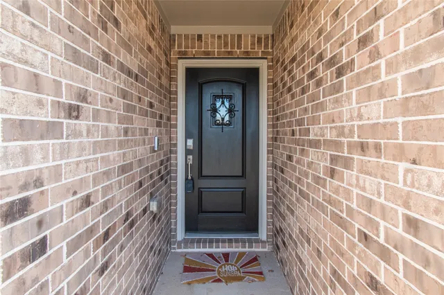 a front view of a house with a door