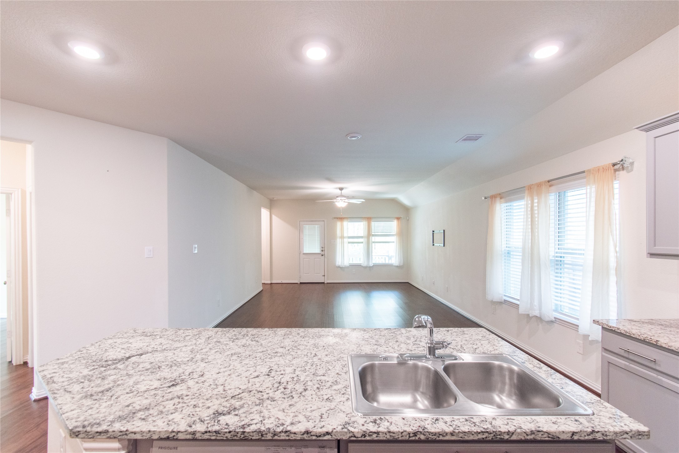4639 Sequoia Echo Drive Spring, TX 77386 - Photo 9 of 30 a kitchen with stainless steel appliances granite countertop a sink a stove and a granite counter tops