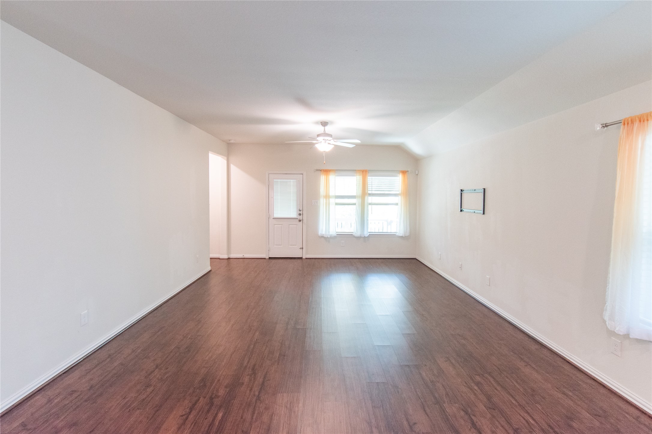 4639 Sequoia Echo Drive Spring, TX 77386 - Photo 10 of 30 an empty room with wooden floor and windows
