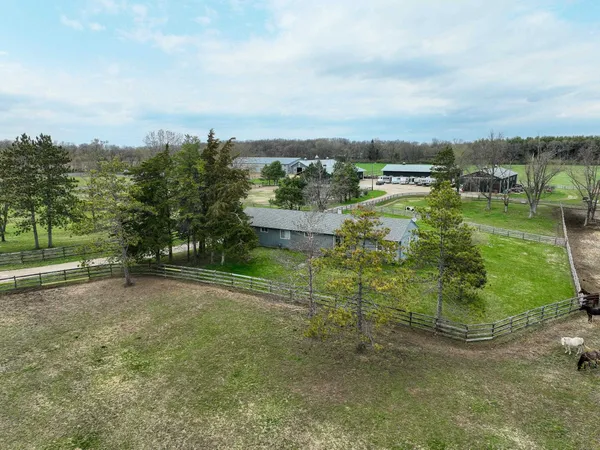 an aerial view of a houses with outdoor space