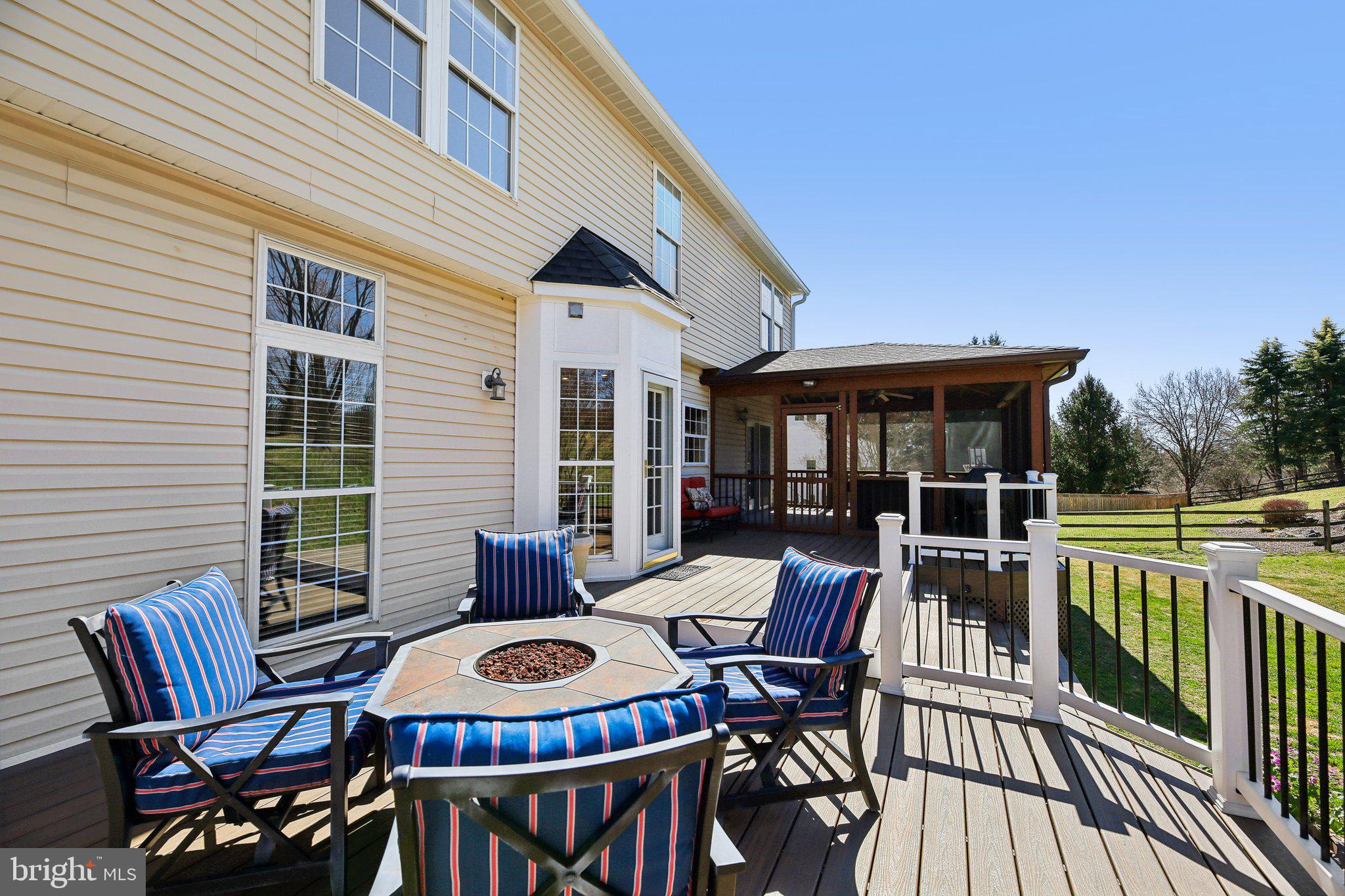 10204 Crosscut Way Damascus, MD 20872 - Photo 27 of 65 a outdoor space with patio the couches and a potted plant