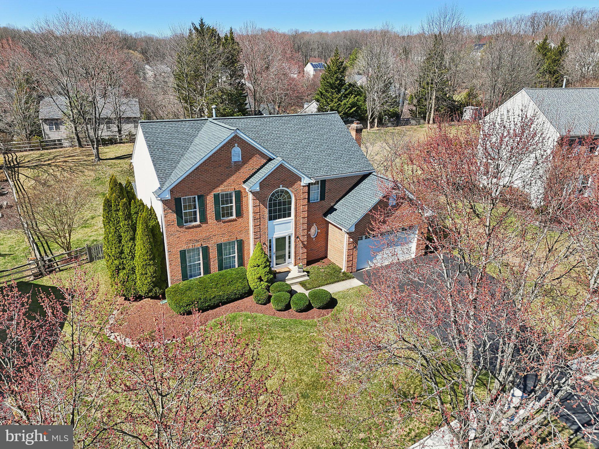 10204 Crosscut Way Damascus, MD 20872 - Photo 4 of 65 a aerial view of a house next to a yard