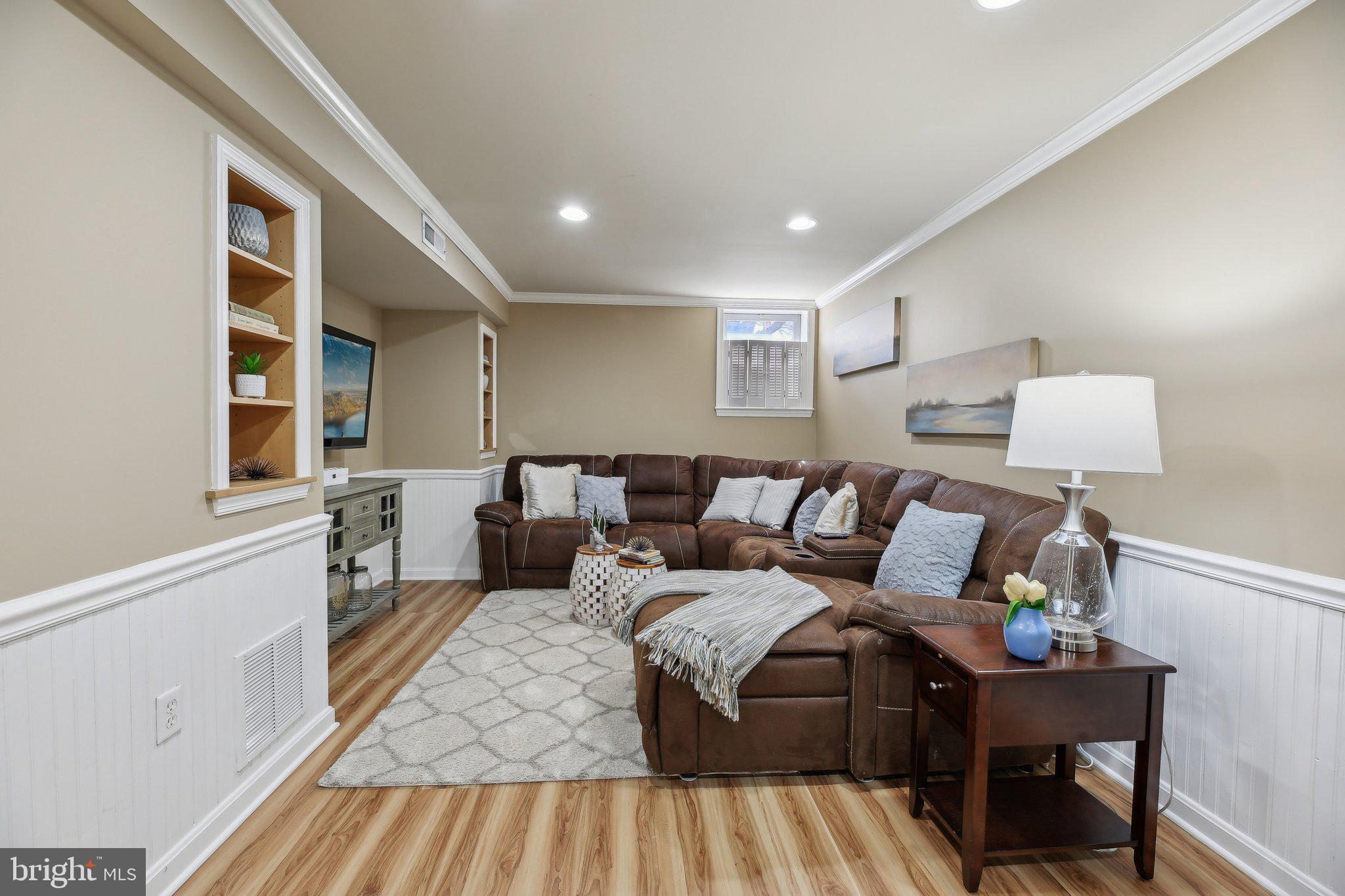 10204 Crosscut Way Damascus, MD 20872 - Photo 42 of 65 a living room with furniture and a couch