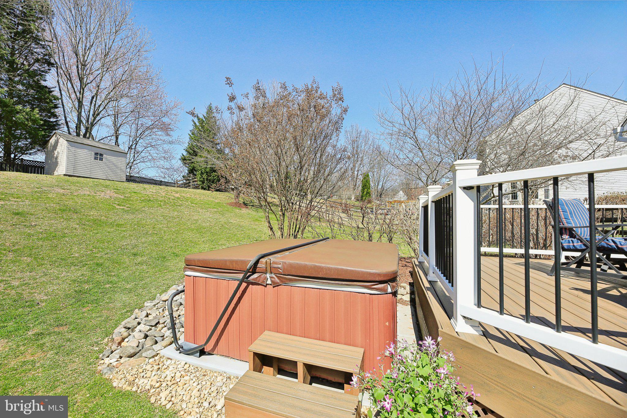 10204 Crosscut Way Damascus, MD 20872 - Photo 51 of 65 a front view of a house with garden