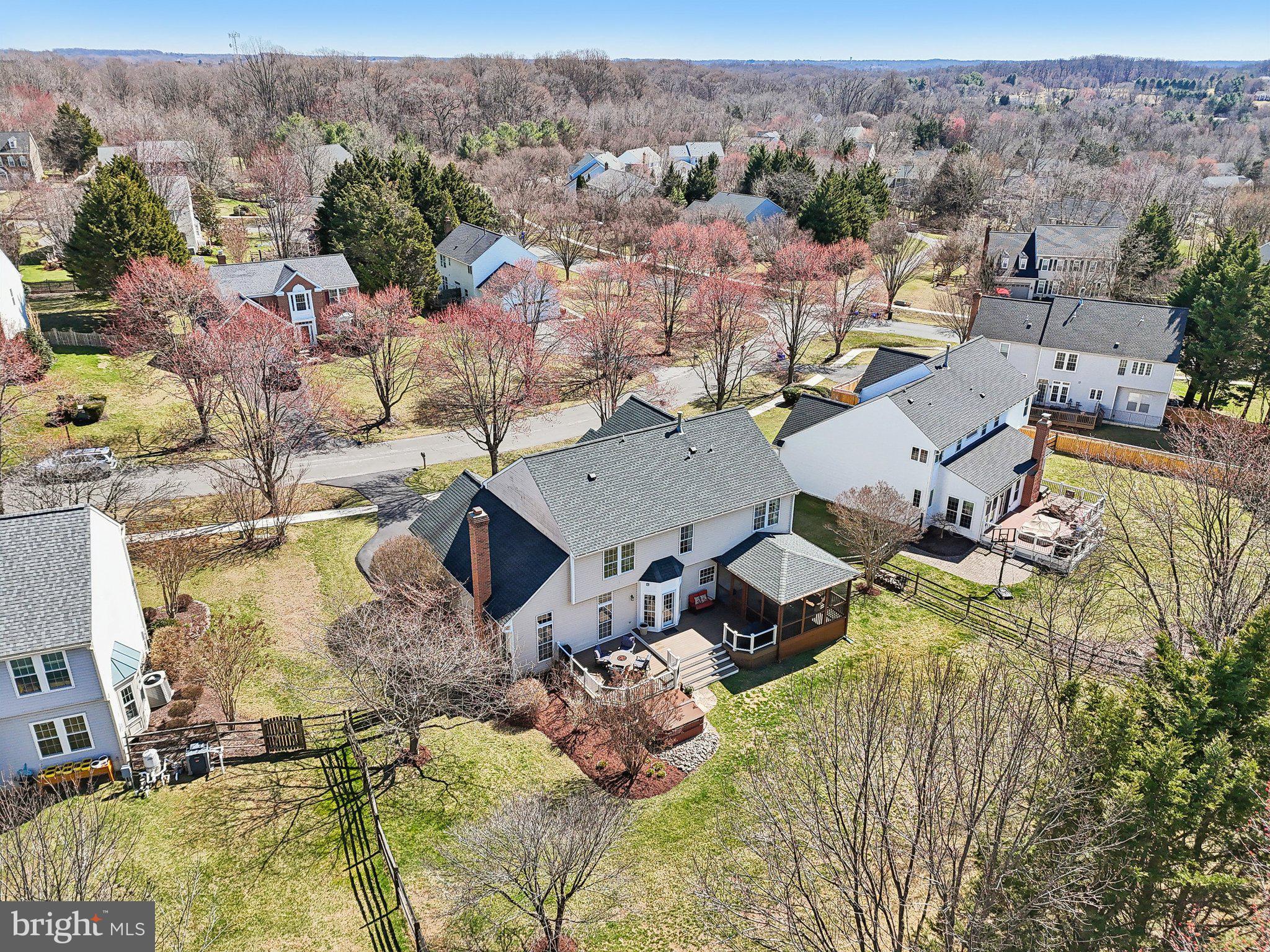10204 Crosscut Way Damascus, MD 20872 - Photo 59 of 65 an aerial view of a houses with a swimming pool