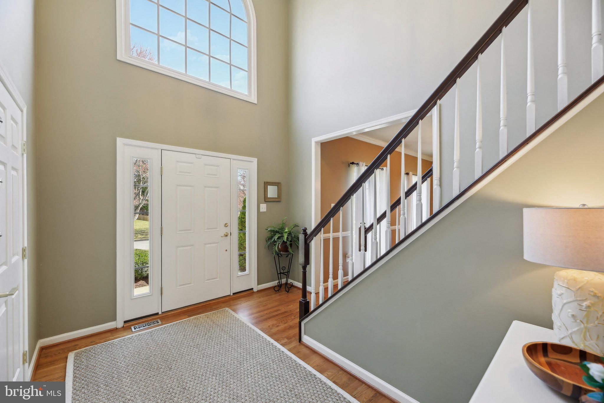 10204 Crosscut Way Damascus, MD 20872 - Photo 8 of 65 a view of entryway with wooden floor