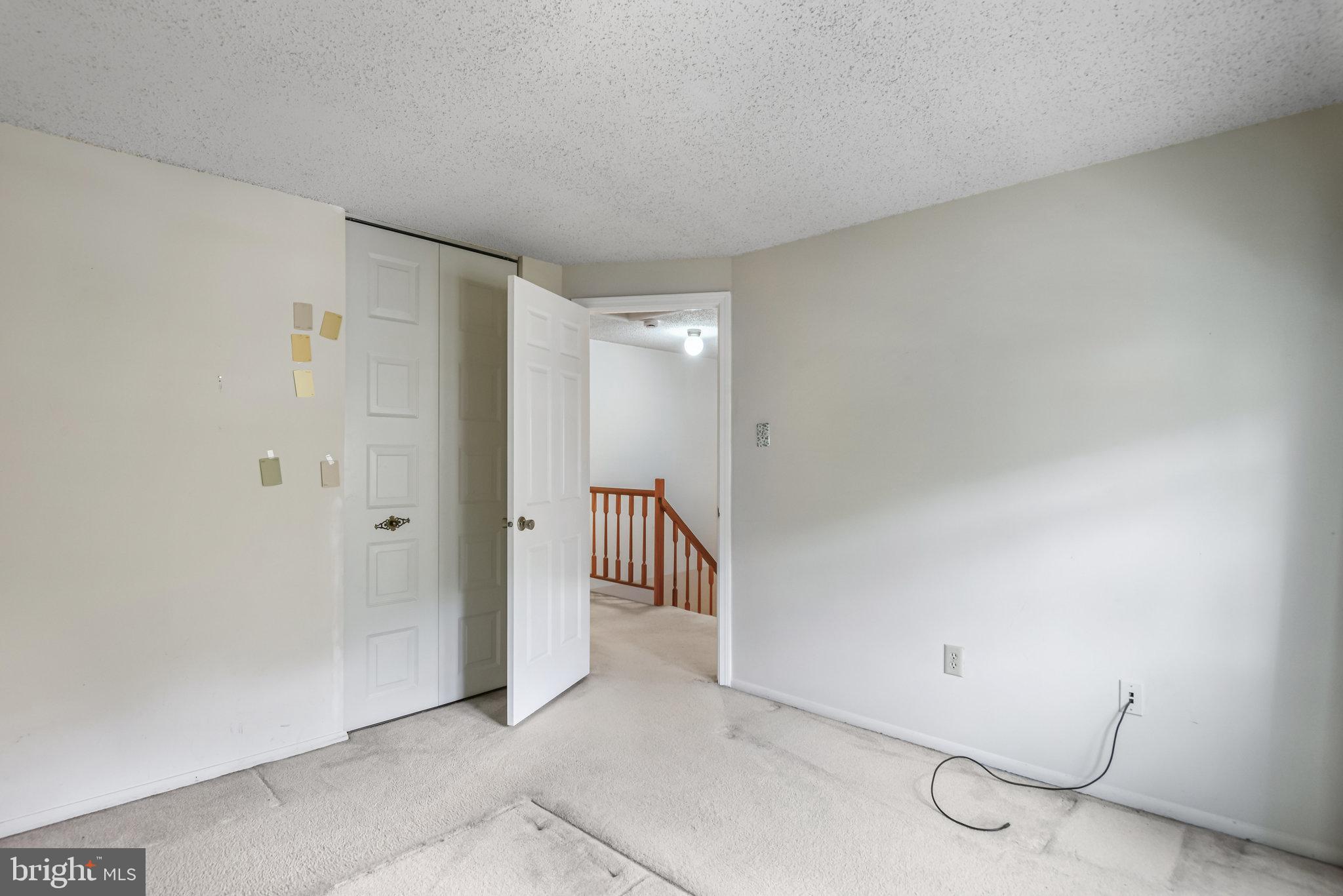 5825 High Bluff Court Burke, VA 22015 - Photo 28 of 52 a view of an empty room