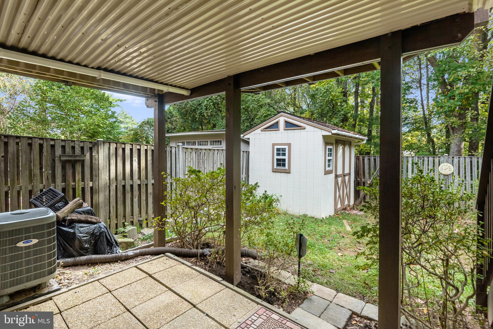 5825 High Bluff Court Burke, VA 22015 - Photo 42 of 52 a view of a house with backyard and balcony