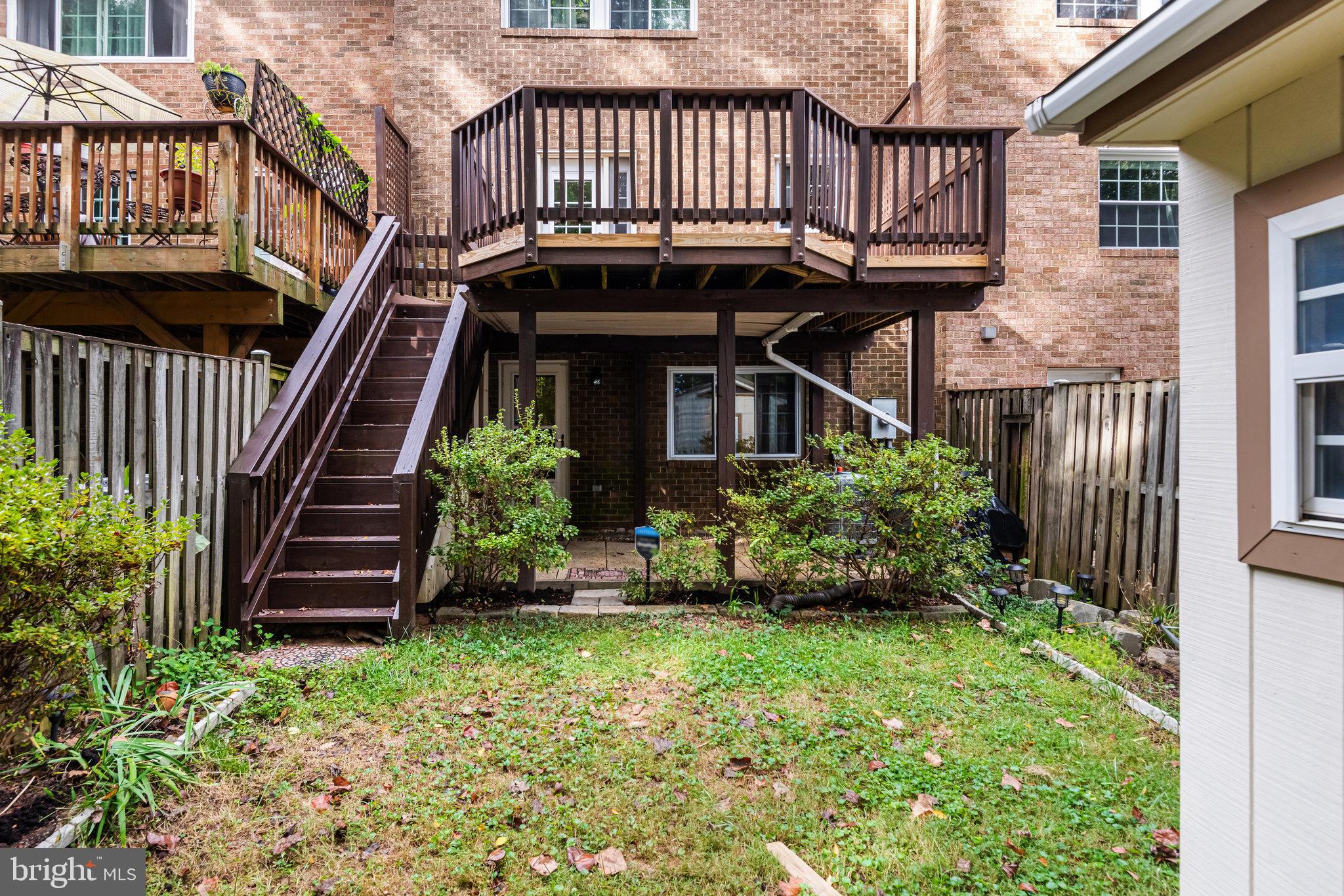 5825 High Bluff Court Burke, VA 22015 - Photo 45 of 52 front view of a house with a small yard
