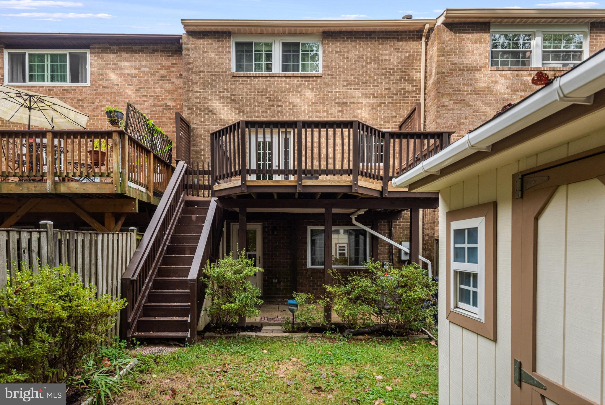 5825 High Bluff Court Burke, VA 22015 - Photo 49 of 52 a view of front door of house with stairs