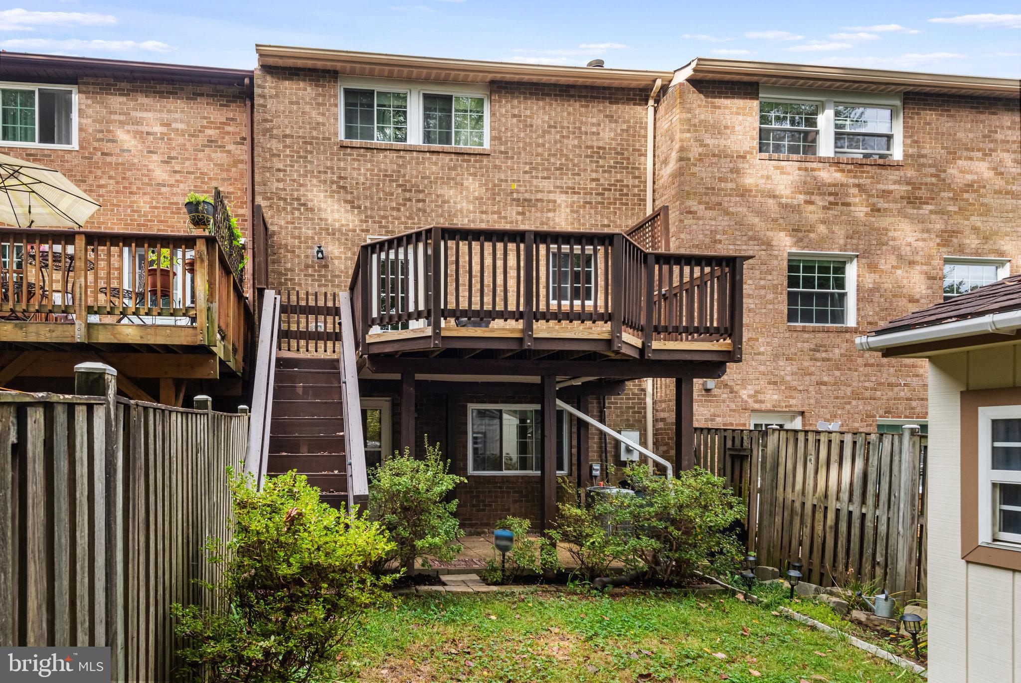 5825 High Bluff Court Burke, VA 22015 - Photo 51 of 52 front view of a house with a yard front of house