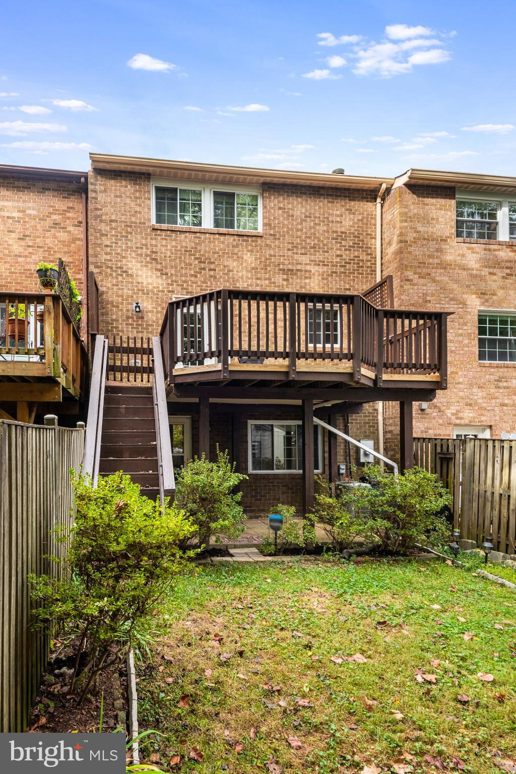 5825 High Bluff Court Burke, VA 22015 - Photo 52 of 52 a front view of a house with a yard