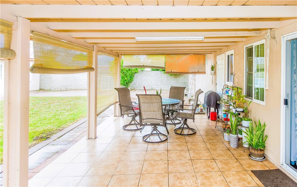 4635 Merced Avenue Baldwin Park, CA 91706 - Photo 12 of 18 a view of a dining room with furniture water view and garden view