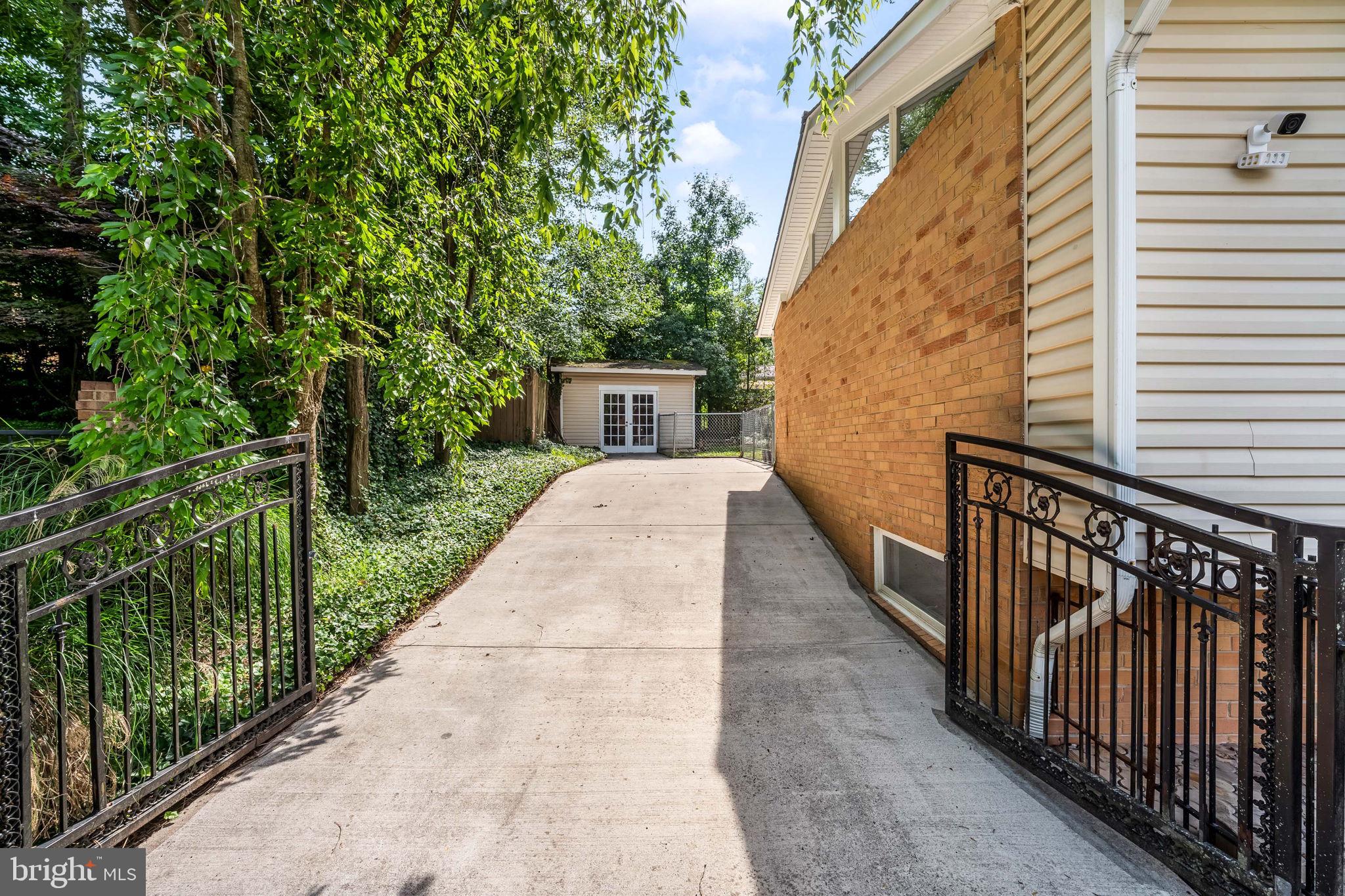 8926 Cromwell Drive Springfield, VA 22151 - Photo 35 of 43 Expansive driveway and storage sheds
