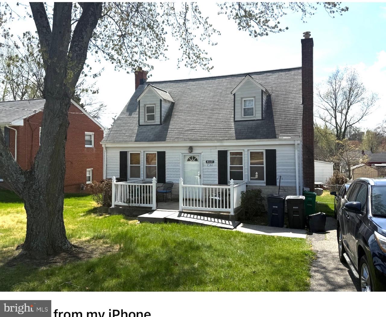 6117 Auth Road Suitland, MD 20746 - Photo 1 of 7 a view of house with backyard and garden