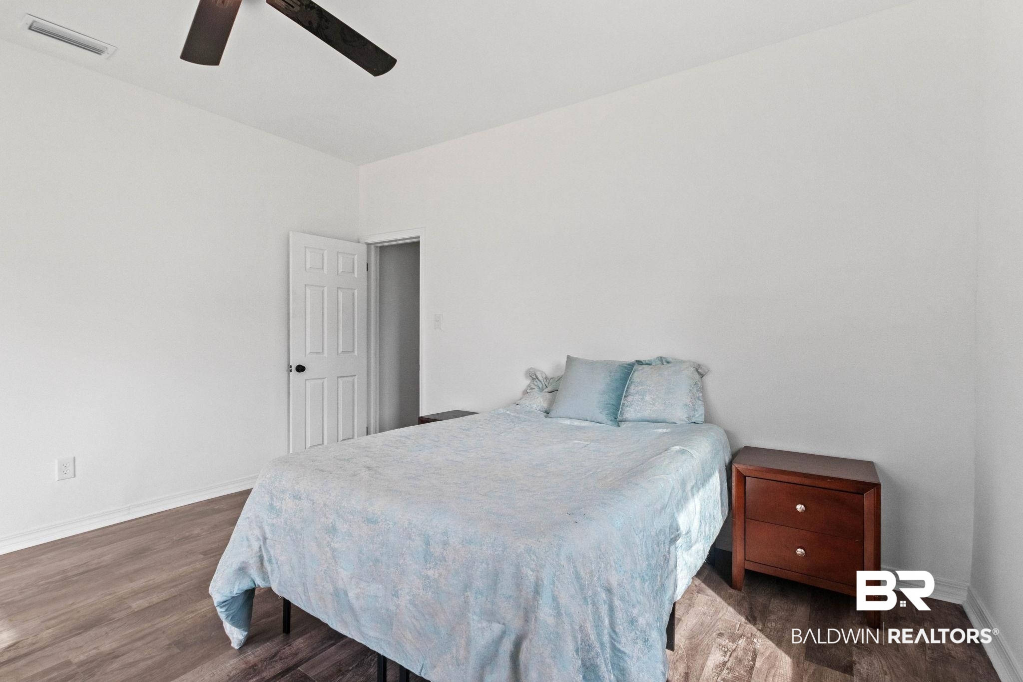 128 Bush Avenue Mobile, AL 36604 - Photo 30 of 40 Bedroom featuring dark wood finished floors and a ceiling fan