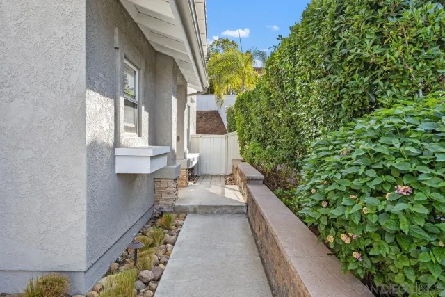 a balcony with wooden floor