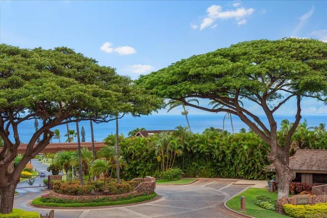 a dining room with furniture window and wooden floor