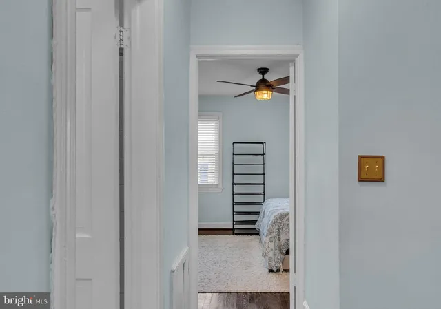 a view of a hallway with a closet