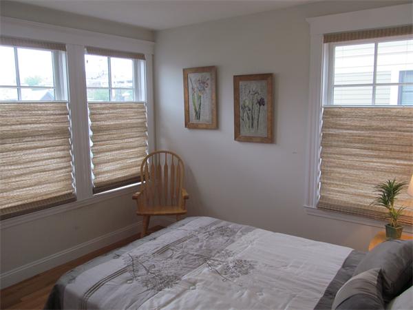 16 Decatur Street, Unit 16 Cambridge, MA 02139 - Photo 4 of 9 a bedroom with a bed and a window