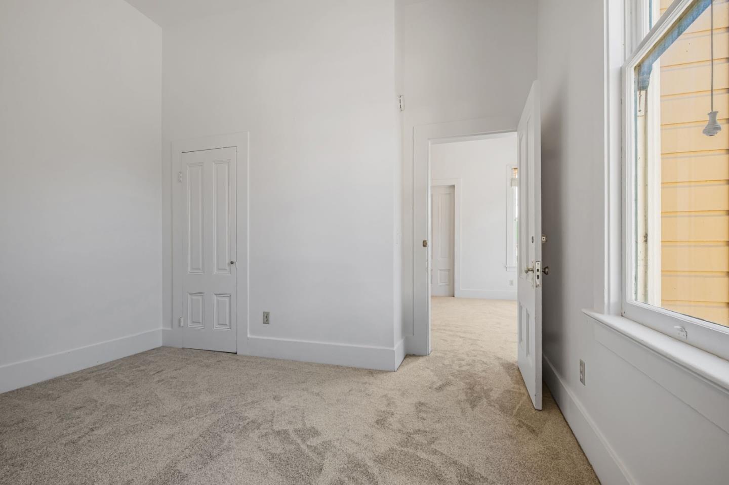 120 Maple Street Santa Cruz, CA 95060 - Photo 21 of 29 a view of an empty room with windows